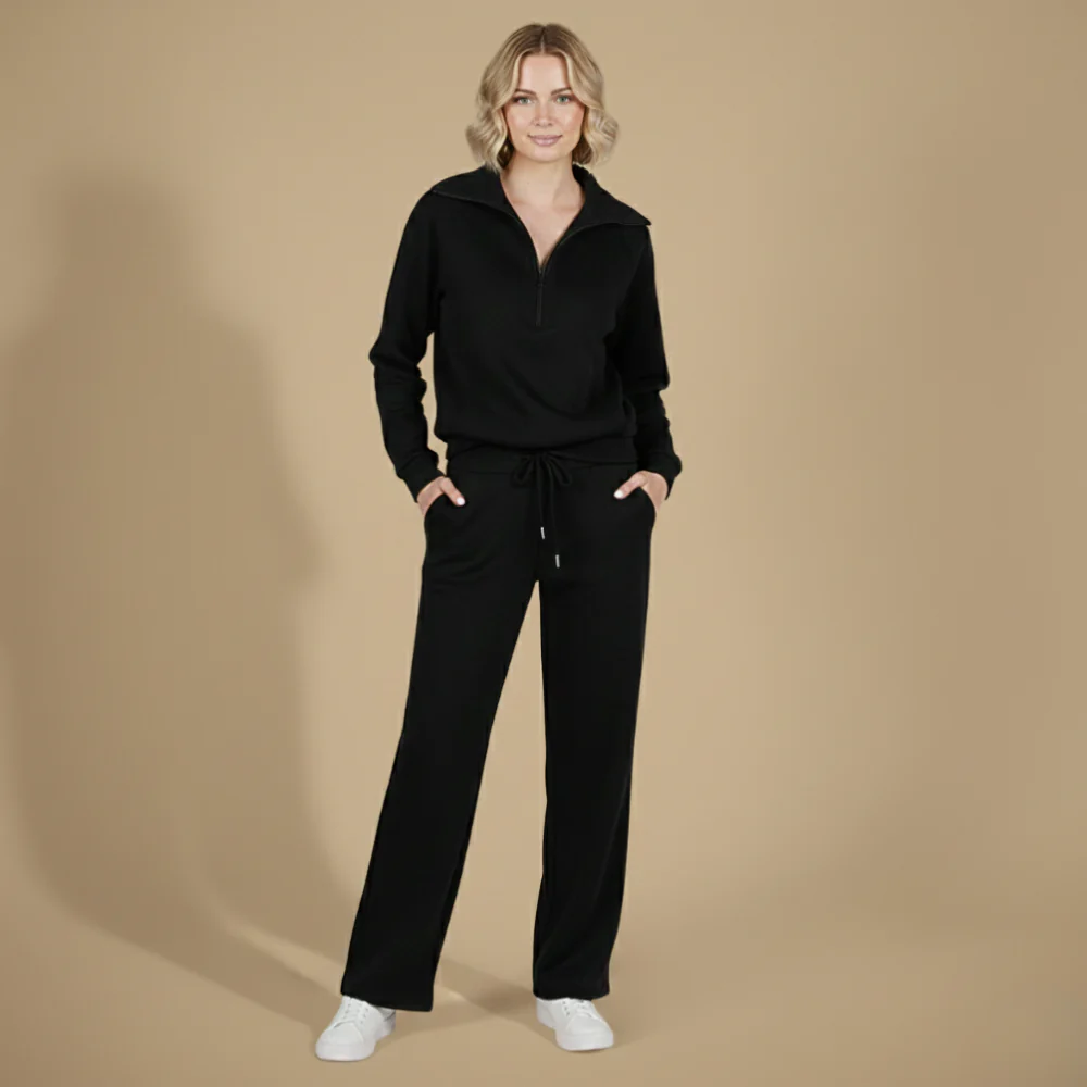 Kvinnor långärmat set med dragkedjetopp och byxor med vida ben