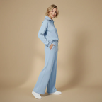 Kvinnor långärmat set med dragkedjetopp och byxor med vida ben