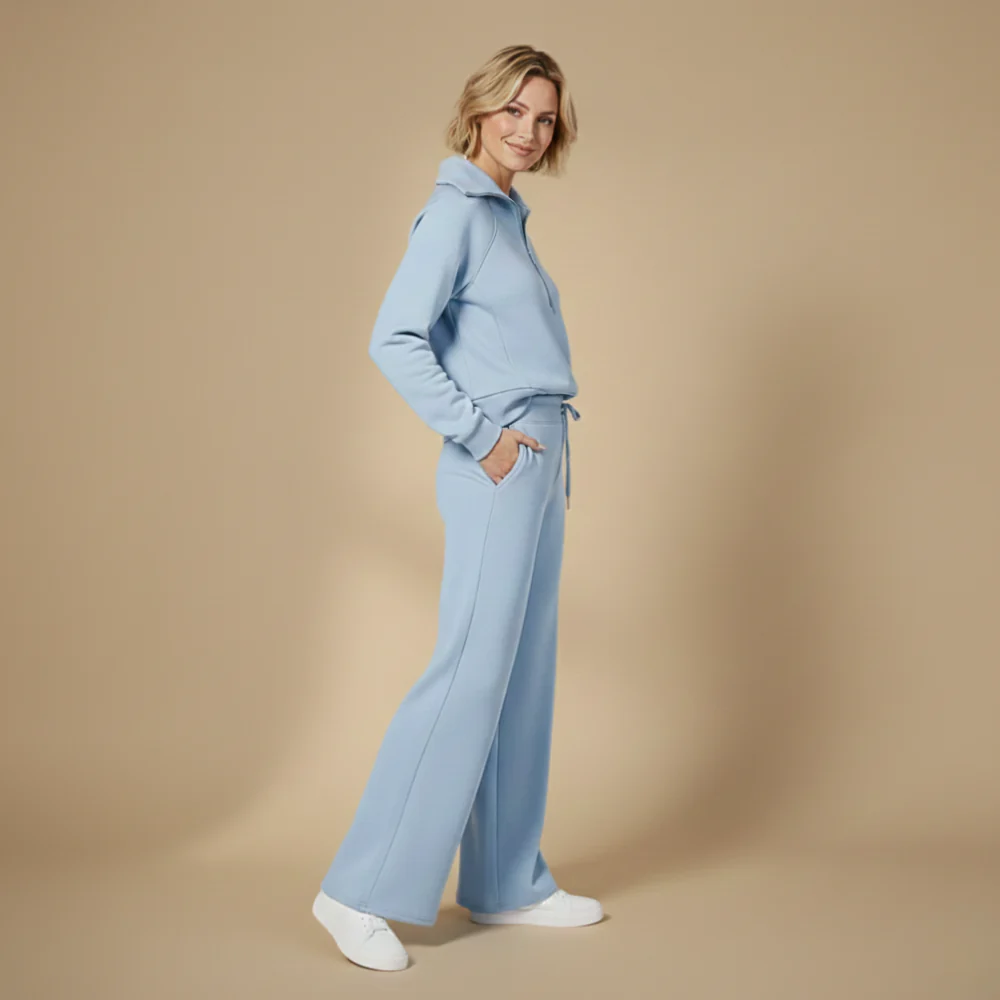 Kvinnor långärmat set med dragkedjetopp och byxor med vida ben