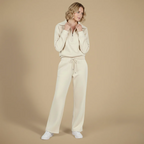 Kvinnor långärmat set med dragkedjetopp och byxor med vida ben