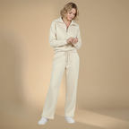 Kvinnor långärmat set med dragkedjetopp och byxor med vida ben